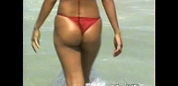  Latina in Bikini Flashes Tits at Beach